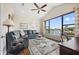 Bright living room features water views, a vaulted ceiling and coastal style furniture at 3353 Sandpiper Dr, Punta Gorda, FL 33950