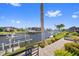 Breathtaking waterfront view features well-maintained landscaping and private boat docks along the serene canal at 3353 Sandpiper Dr, Punta Gorda, FL 33950