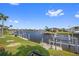 Beautiful waterfront view of private boat docks along the canal with lush landscaping at 3353 Sandpiper Dr, Punta Gorda, FL 33950