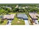 Waterfront homes featuring screened-in pools, mature landscaping, and canal access at 336 Waterside St, Port Charlotte, FL 33954