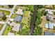 Waterfront homes with swimming pools and private backyard spaces, seen from above at 336 Waterside St, Port Charlotte, FL 33954