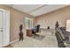 Bright office space featuring neutral walls, plush carpet, and a large window at 336 Waterside St, Port Charlotte, FL 33954
