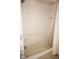 Bathroom featuring tub with hand rails and shower curtain at 3398 Tripoli Blvd, Punta Gorda, FL 33950