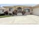 Inviting front entrance with double doors, showcasing the home's facade and landscaping at 3398 Tripoli Blvd, Punta Gorda, FL 33950