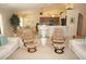 Inviting living room with comfortable seating, open to the kitchen, ideal for entertaining guests at 3398 Tripoli Blvd, Punta Gorda, FL 33950