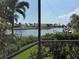 Enjoy picturesque waterfront views from this home, showcasing the tranquil canal and lush landscaping at 3398 Tripoli Blvd, Punta Gorda, FL 33950