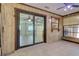 Sunroom featuring tiled floor, views to the living area, plus a view of the backyard and pool at 4071 Dekle Ave, North Port, FL 34286