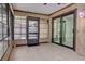 Relaxing sunroom offering access to the outside and an interior area through sliding glass doors at 4071 Dekle Ave, North Port, FL 34286