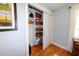Open closet with sliding doors, shelving and rod, ideal for storage and organization at 4216 Bur St, Port Charlotte, FL 33948