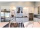 Bright kitchen featuring stainless steel appliances, white cabinets and granite countertops at 4216 Bur St, Port Charlotte, FL 33948