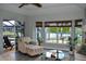 Cozy sitting area with water views, comfortable seating, and ample natural light streaming in at 4216 Bur St, Port Charlotte, FL 33948