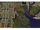 A location aerial view shows proximity to waterways and neighborhood layout of 4216 Bur St at 4216 Bur St, Port Charlotte, FL 33948