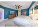 Comfortable main bedroom with stylish decor, fan, and dresser at 4216 Bur St, Port Charlotte, FL 33948