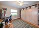 Versatile room with a Murphy bed and built-in shelving, perfect for an office or guest room at 4216 Bur St, Port Charlotte, FL 33948