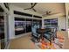 The home features a covered patio with comfortable seating, ceiling fans, and access to the pool at 4216 Bur St, Port Charlotte, FL 33948