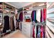 Organized walk-in closet with shelves, hanging racks, and a dresser for ample storage at 4216 Bur St, Port Charlotte, FL 33948