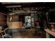 The unfinished basement features exposed beams, unfinished walls, and concrete flooring at 426 Burland St, Punta Gorda, FL 33950