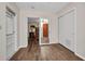 Empty bedroom features an open layout to the main bedroom, with wood-look floors at 426 Burland St, Punta Gorda, FL 33950
