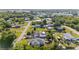 Scenic aerial view showcasing a charming neighborhood with mature trees and cozy homes at 4702 Westwood Dr, Punta Gorda, FL 33982