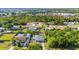 Aerial view of a quiet neighborhood with homes surrounded by lush greenery at 4702 Westwood Dr, Punta Gorda, FL 33982
