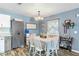 Light and bright dining room with wood look floors and rustic decor at 4702 Westwood Dr, Punta Gorda, FL 33982
