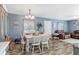Bright dining room with rustic details and plenty of space for entertaining at 4702 Westwood Dr, Punta Gorda, FL 33982
