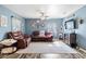 Spacious living room with comfortable seating, soft carpet, and ample natural light at 4702 Westwood Dr, Punta Gorda, FL 33982