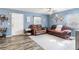 Spacious living room with comfortable seating, soft carpet, and ample natural light at 4702 Westwood Dr, Punta Gorda, FL 33982