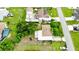 Aerial view of property showcasing the layout of the home, large yard, and surrounding neighborhood at 481 Reading Nw St, Port Charlotte, FL 33952