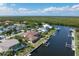 Waterfront property with access to a private dock, pool, and outdoor entertainment at 5023 Key Largo Dr, Punta Gorda, FL 33950