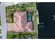 Aerial view of the property highlighting its large lot and waterfront access at 5023 Key Largo Dr, Punta Gorda, FL 33950