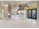 Bright and spacious kitchen with white cabinets, granite countertops, and a breakfast bar at 5023 Key Largo Dr, Punta Gorda, FL 33950