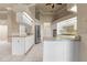 Spacious kitchen with white cabinetry, granite countertops and stainless steel appliances at 5023 Key Largo Dr, Punta Gorda, FL 33950