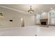 Spacious living room features a fireplace and large windows with seating at 5023 Key Largo Dr, Punta Gorda, FL 33950