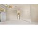 Spacious and bright living room with neutral paint and tiled flooring at 5023 Key Largo Dr, Punta Gorda, FL 33950