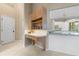 Cozy built-in office nook in kitchen area with matching granite countertops at 5023 Key Largo Dr, Punta Gorda, FL 33950