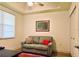 Comfortable sitting area with couch and window at 5114 Melbourne St # A302, Punta Gorda, FL 33980
