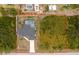 Aerial shot of the home with screened-in pool, offering a birds-eye perspective of its outdoor features at 5532 Veracruz Ter, Port Charlotte, FL 33981