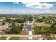 Sprawling lot with a well-manicured home and landscaping, lush trees, and ample privacy at 5532 Veracruz Ter, Port Charlotte, FL 33981