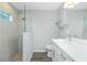 Modern bathroom featuring a walk-in shower and sleek vanity at 5532 Veracruz Ter, Port Charlotte, FL 33981