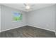 Bedroom featuring hardwood floors and natural light at 5532 Veracruz Ter, Port Charlotte, FL 33981