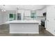 Modern kitchen with stainless steel appliances, ample counter space on the island, and stylish cabinets at 5532 Veracruz Ter, Port Charlotte, FL 33981