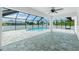 Large screened-in pool with a spacious patio, perfect for outdoor relaxation and entertaining at 5532 Veracruz Ter, Port Charlotte, FL 33981