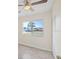 Bright bedroom with large window letting in natural light and tile floors at 6850 S Biscayne Dr, North Port, FL 34287