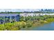 Waterfront community with well-maintained properties and lush landscaping at 936 Hemingway Cir, Tampa, FL 33602
