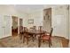 Elegant dining room with hardwood floors, and a formal dining table with seating for six at 936 Hemingway Cir, Tampa, FL 33602