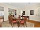 Inviting dining room with hardwood floors, elegant furnishings, and ample natural light at 936 Hemingway Cir, Tampa, FL 33602