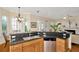 Bright kitchen with stainless steel dishwasher, ample counter space, and natural light at 936 Hemingway Cir, Tampa, FL 33602