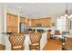 Well-equipped kitchen features sleek countertops, stainless steel appliances, and breakfast bar seating at 936 Hemingway Cir, Tampa, FL 33602