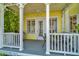 Inviting outdoor porch with an overhead fan, ideal for relaxing or entertaining guests at 936 Hemingway Cir, Tampa, FL 33602